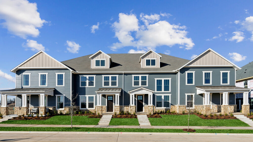 Exterior of the CB JENI Homes Village at Midtowne townhome model in Midlothian, TX.