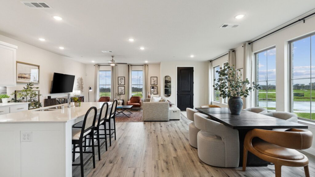 Living and dining room in the Hansen Floorplan of a CB JENI townhome.