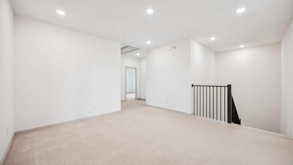 Game Room in the Emily Floorplan at The Village at Midtowne in Midlothian, TX.