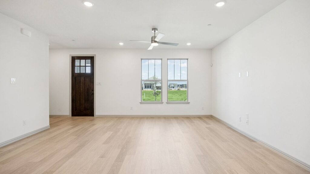 Family Room in the Emily Floorplan at The Village at Midtowne in Midlothian, TX.