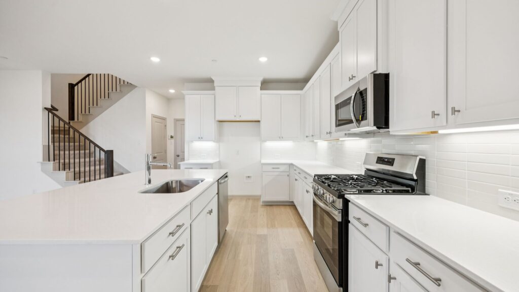 Kitchen in the Emily Floorplan at The Village at Midtowne in Midlothian, TX.