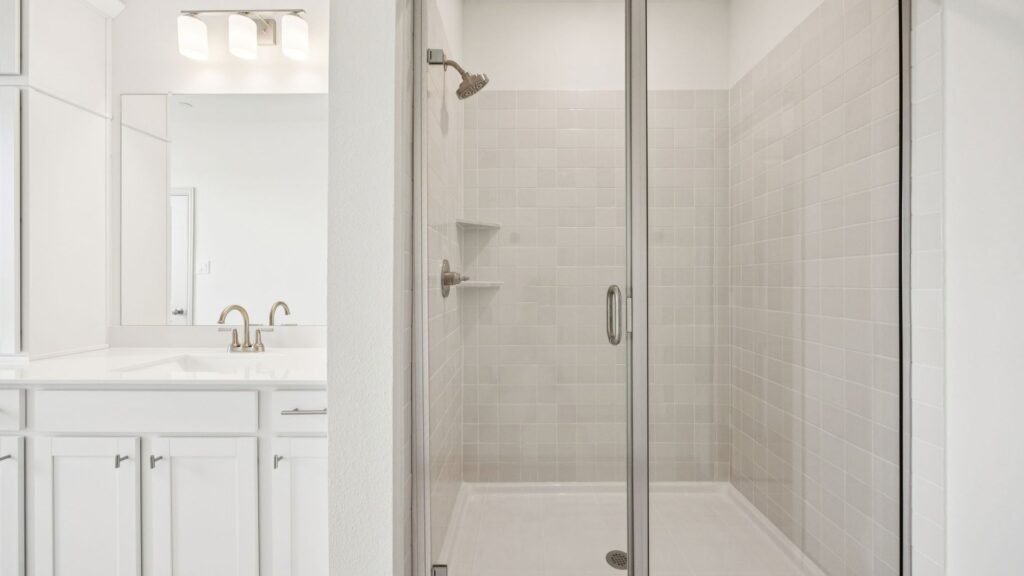 Owner's Bath in the Emily Floorplan at The Village at Midtowne in Midlothian, TX.
