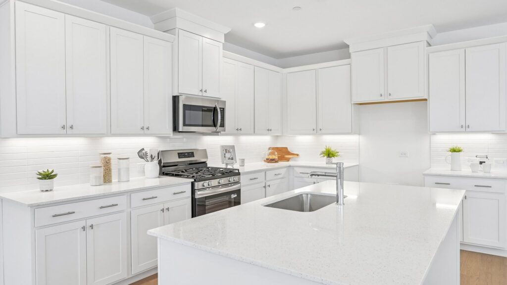 Kitchen in the Hansen floorplan at Painted Tree Woodland District in McKinney, TX.